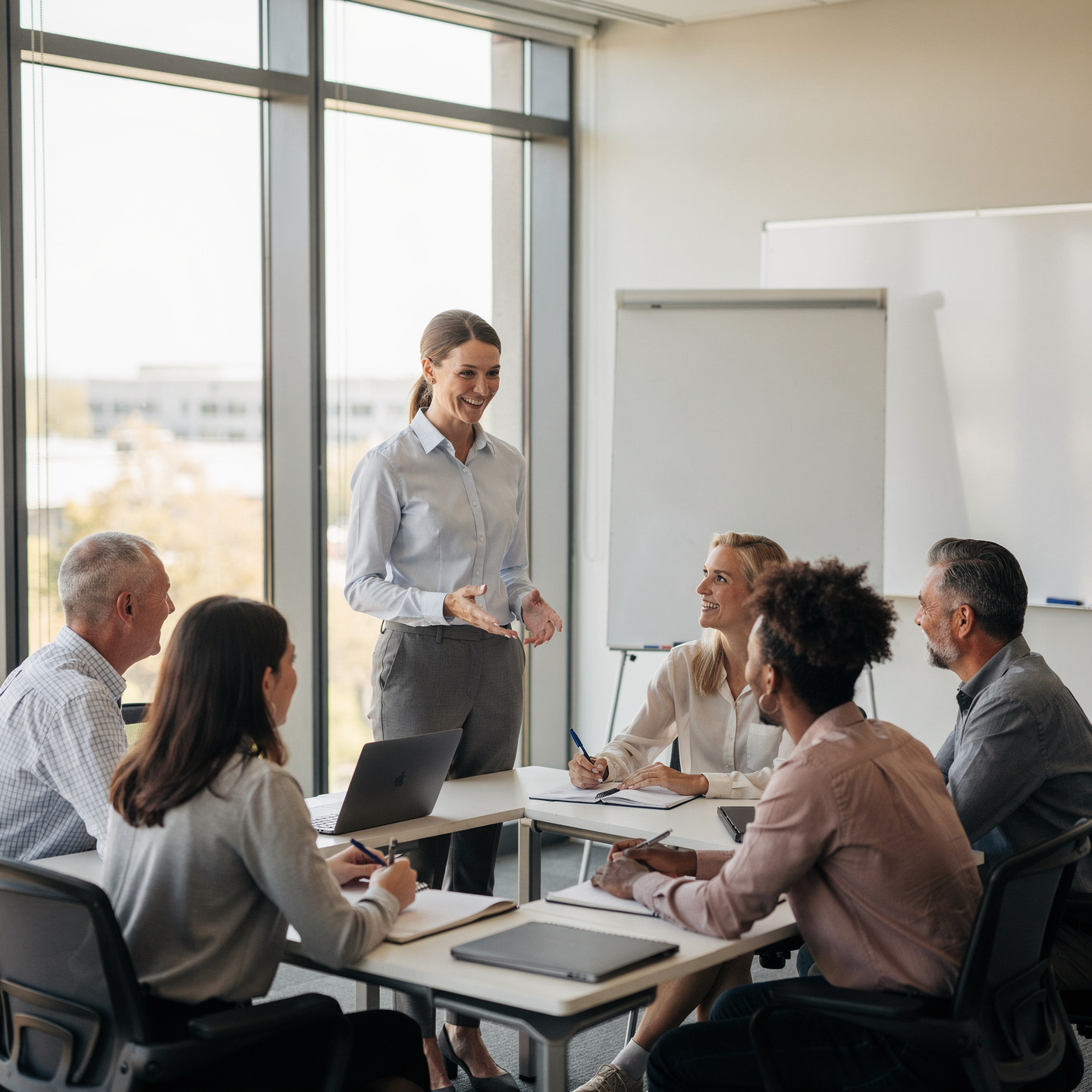 flux pro 2.0 modern english class for beginners in a corporate training room. professional te 0